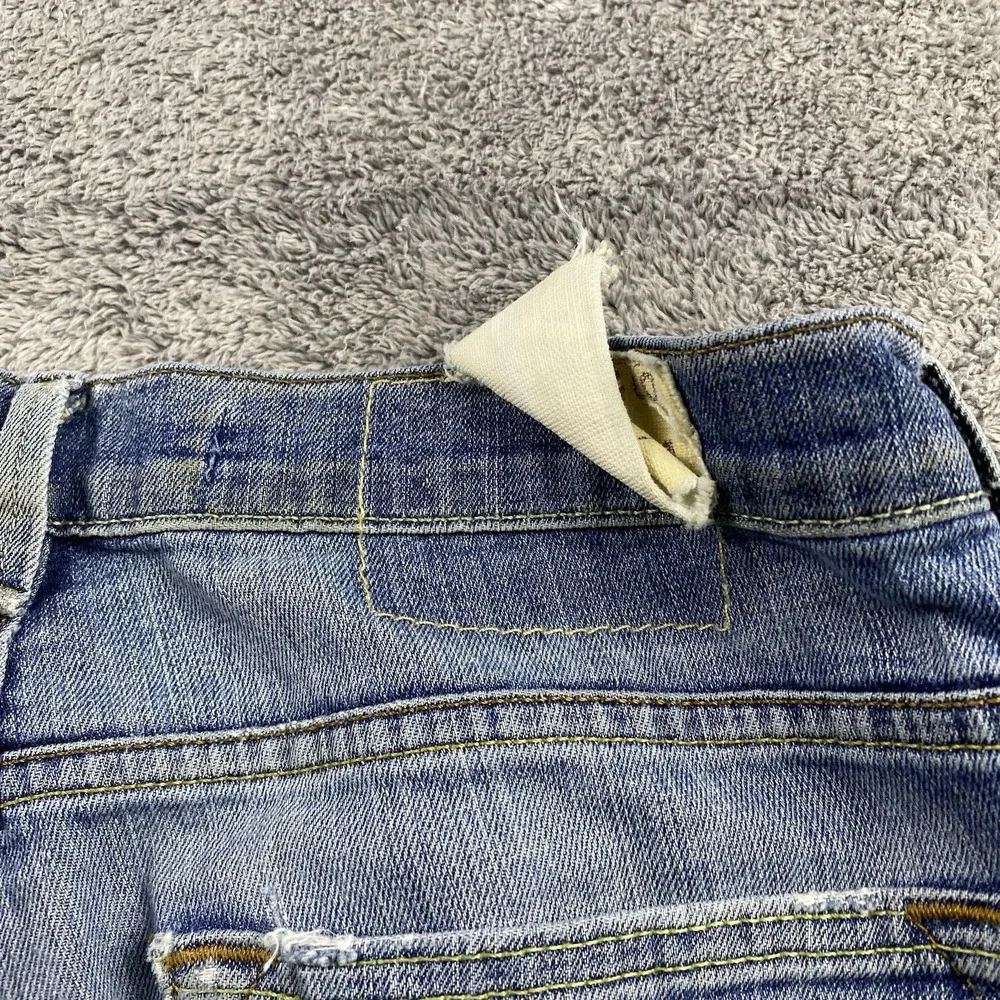 Levi's 519 Slim Jeans Mens 32X34‎ Blue Medium Wash Low Rise Distressed